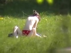 A creeper in the bushes catches a nude pair fucking in the park with his cam. Their nude bodies receive it on and enjoy their sex without a care in the world or the slightest suspicion that someone may be lurking.