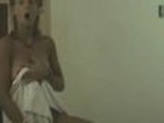 Lively chick looks so gorgeous after taking the shower! Her towel falls down and she stays nude previous to camera exposing perfect miniature boobs!