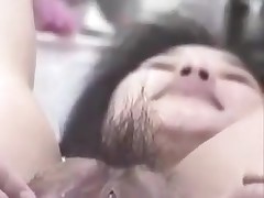 Korean wench with big pussy and pouty lips receives nasty on camera. That babe stuffs her curly pussy with fingers, metal balls and even a bottle. This cum-hole can swallow a lot of ball cream too!